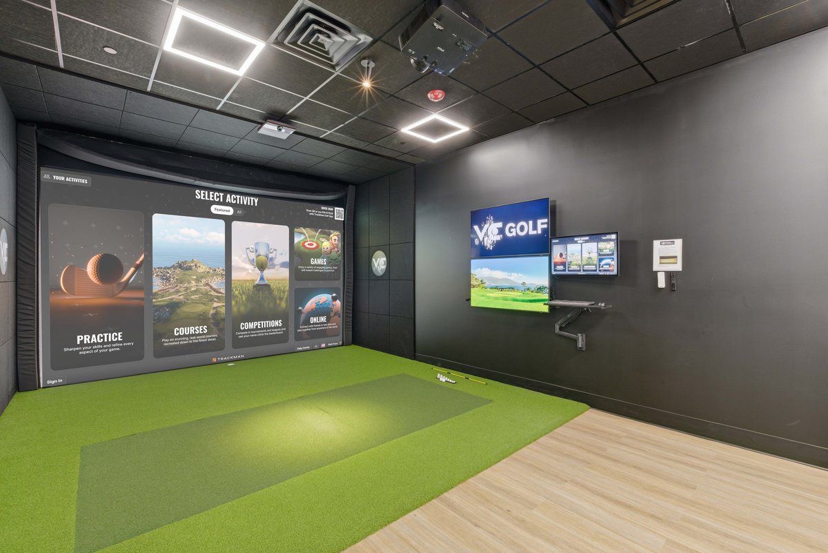 Simulator suite and lounge seating at The Virtual Clubhouse